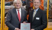 John Galt (right), president and CEO of Husky Injection Molding Systems, presents the “EMEA Supplier of the Year” award to Hans Beckhoff, managing director and owner of Beckhoff Automation, in October 2019 at the K show in Düsseldorf, Germany. Photo: Beckhoff Automation